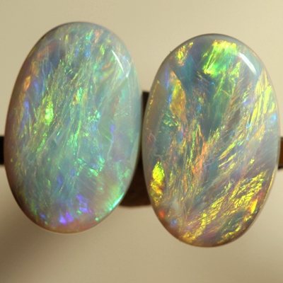 SOLID SEMI BLACK OPALS Matching pair. Bright, strong fire. SEE VIDEO